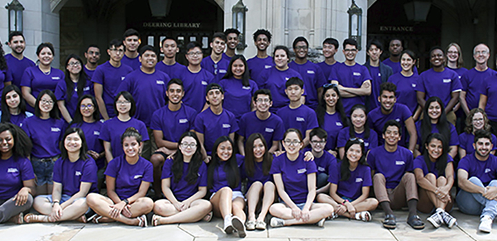 Group photo of students in front of Deering Library